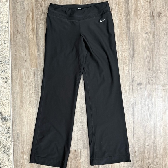 Nike • Dri Fit Flare Leg Pants - Picture 1 of 11